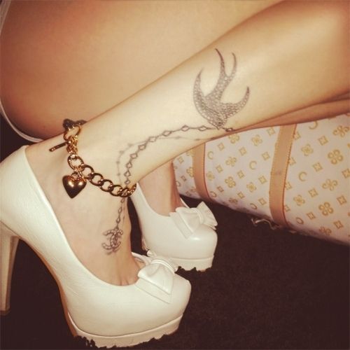white heels & black tattoo